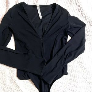 FREE PEOPLE Black deep-V  thong bodysuit. Long sleeve Size Small